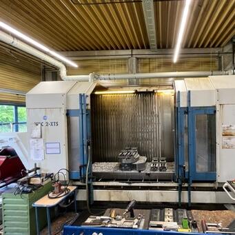 Second hand AXA VHC-2 XTS/50 5 Axis Traveling Column Machine Center for Sale | Asset-Trade